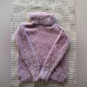 Woman’s Pink Fluffy Turtle Neck Sweater